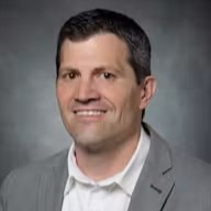 https___i.imgur.com_JO3w3Yi Headshot of Christopher Modlesky.